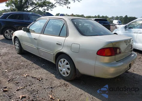 2002 Toyota Corolla Le z USA, uszkodzony, nr VIN 1NXBR12E12Z612437